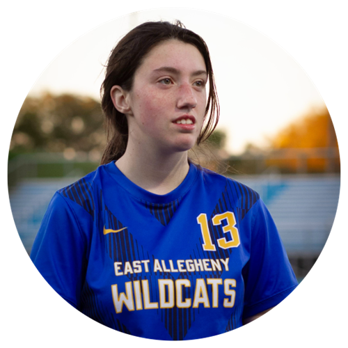 Headshot of Kelsey Ace on Soccer field