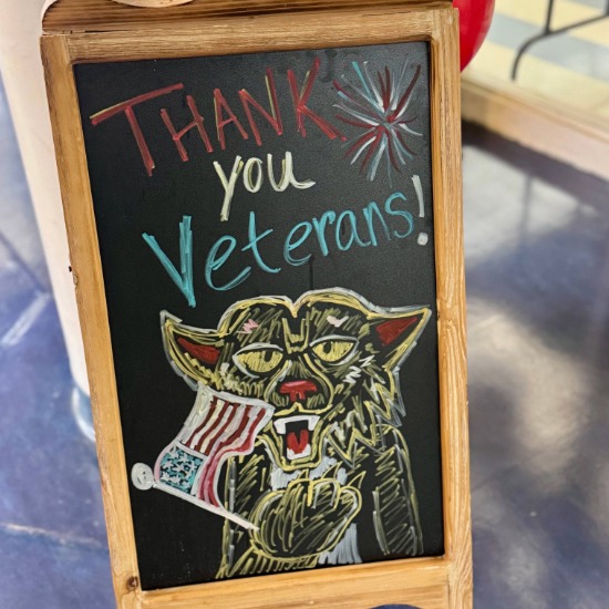  chalk sign that says thank you veterans